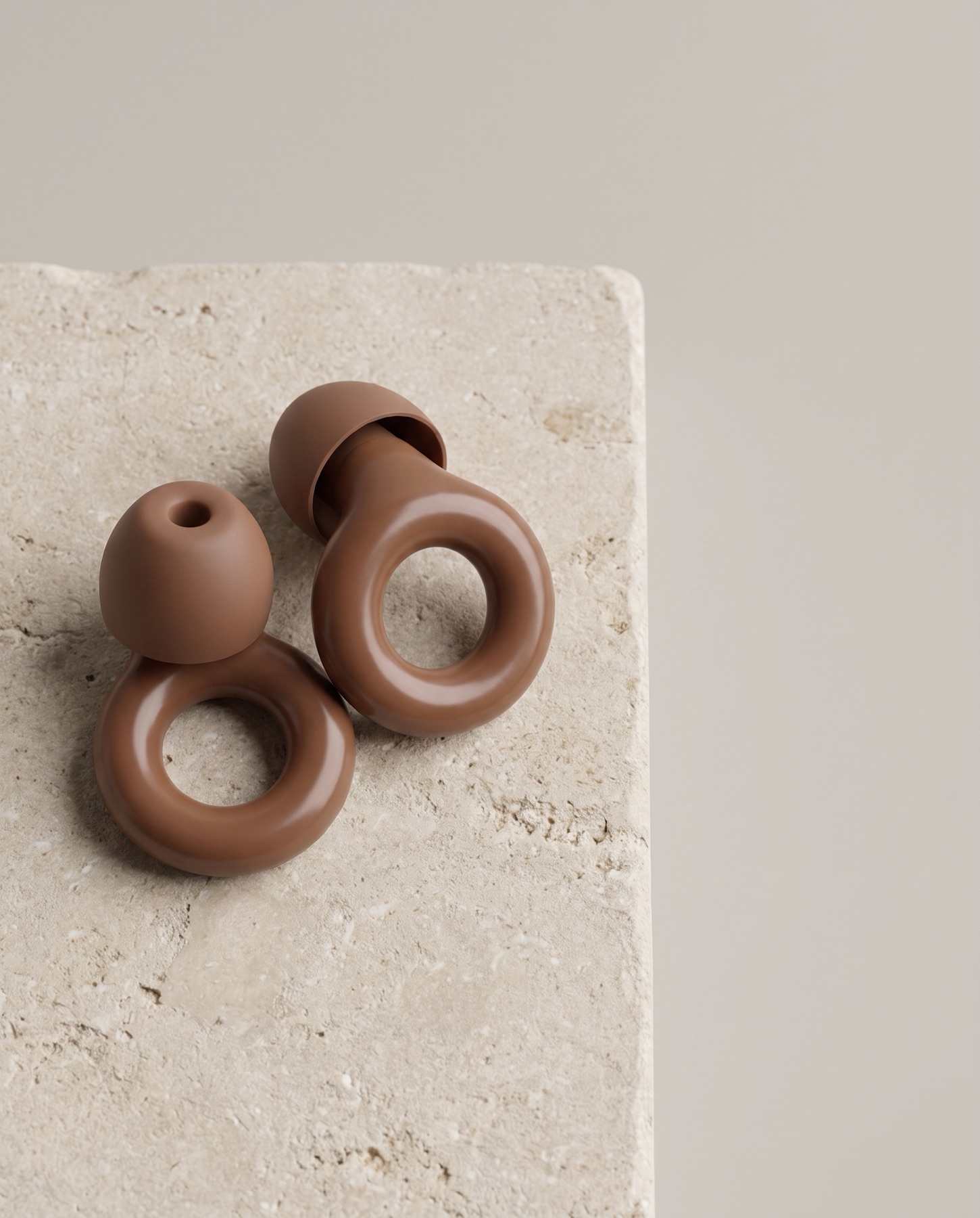 Earplugs and case · Brown