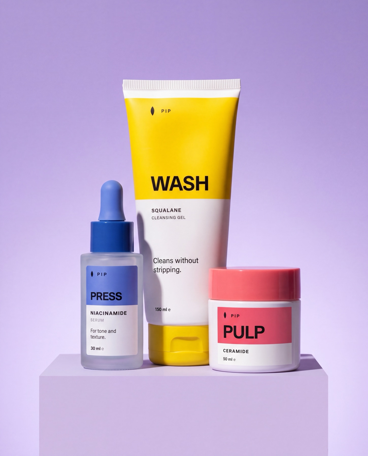 Pip skincare products grouped on a lilac campaign background